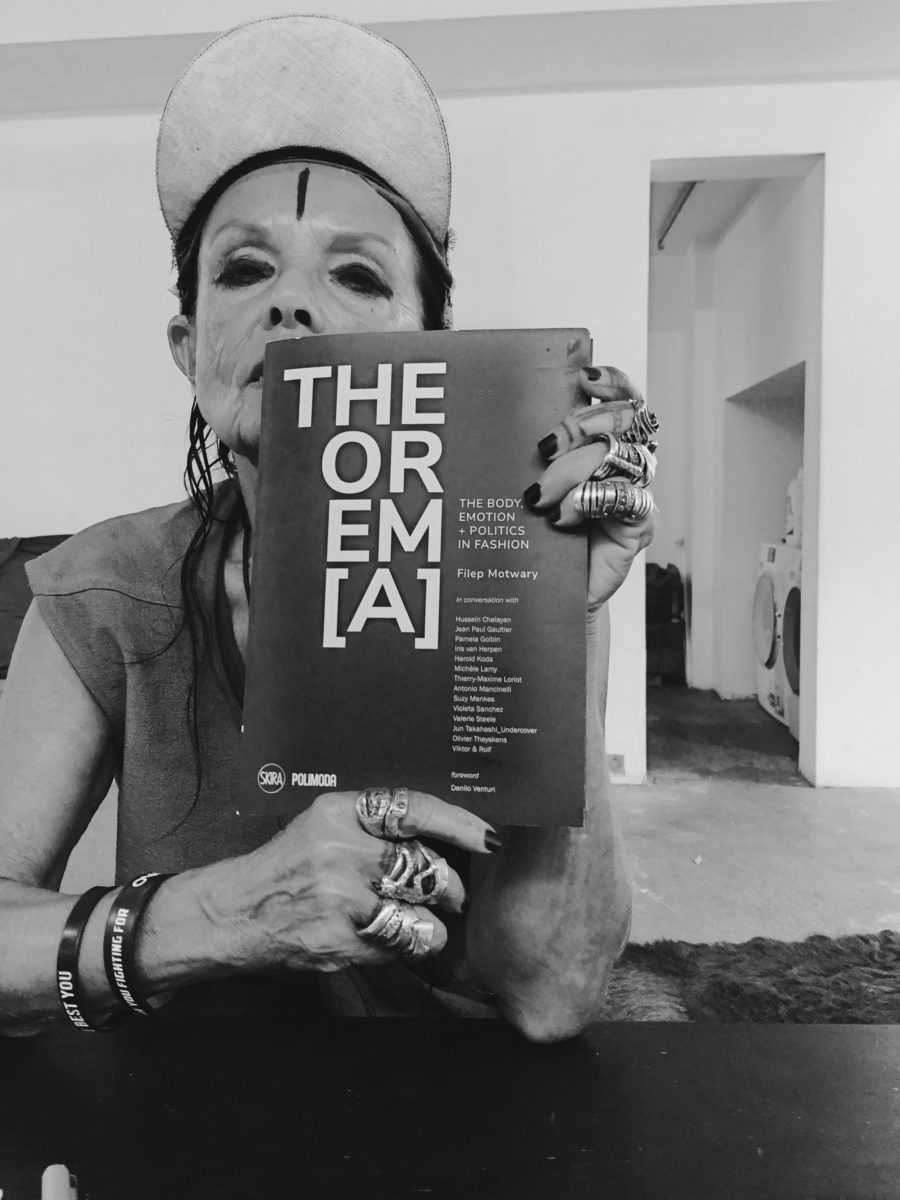 Curator, author, journalist, photographer and costume designer Filep Motwary releases his latest book ideated by Polimoda, THEOREM[A]: The Body, Emotion + Politics in Fashion, published by Skira Editore.  Formatted as a series of interviews with select contemporary fashion key figures, the book investigates the dressed body as a political statement, focusing on the linked trilogy of the mind, body and politics. In his provocative series of interviews, Motwary spoke with participants chosen for their professional integrity, their body of work and vast knowledge of historical and contemporary fashion, among other factors. Interviews were conducted with Hussein Chalayan, Jean Paul Gaultier, Pamela Golbin, Iris van Herpen, Harold Koda, Michèle Lamy, Thierry-Maxime Loriot, Antonio Mancinelli, Suzy Menkes, Violeta Sanchez, Valerie Steele, Jun Takahashi, Olivier Theyskens, Viktor & Rolf . The interviews each explore the essence and perception of the body, poetic emotion and politics, touching specifically on the issues and controversies surrounding the current state of fashion.